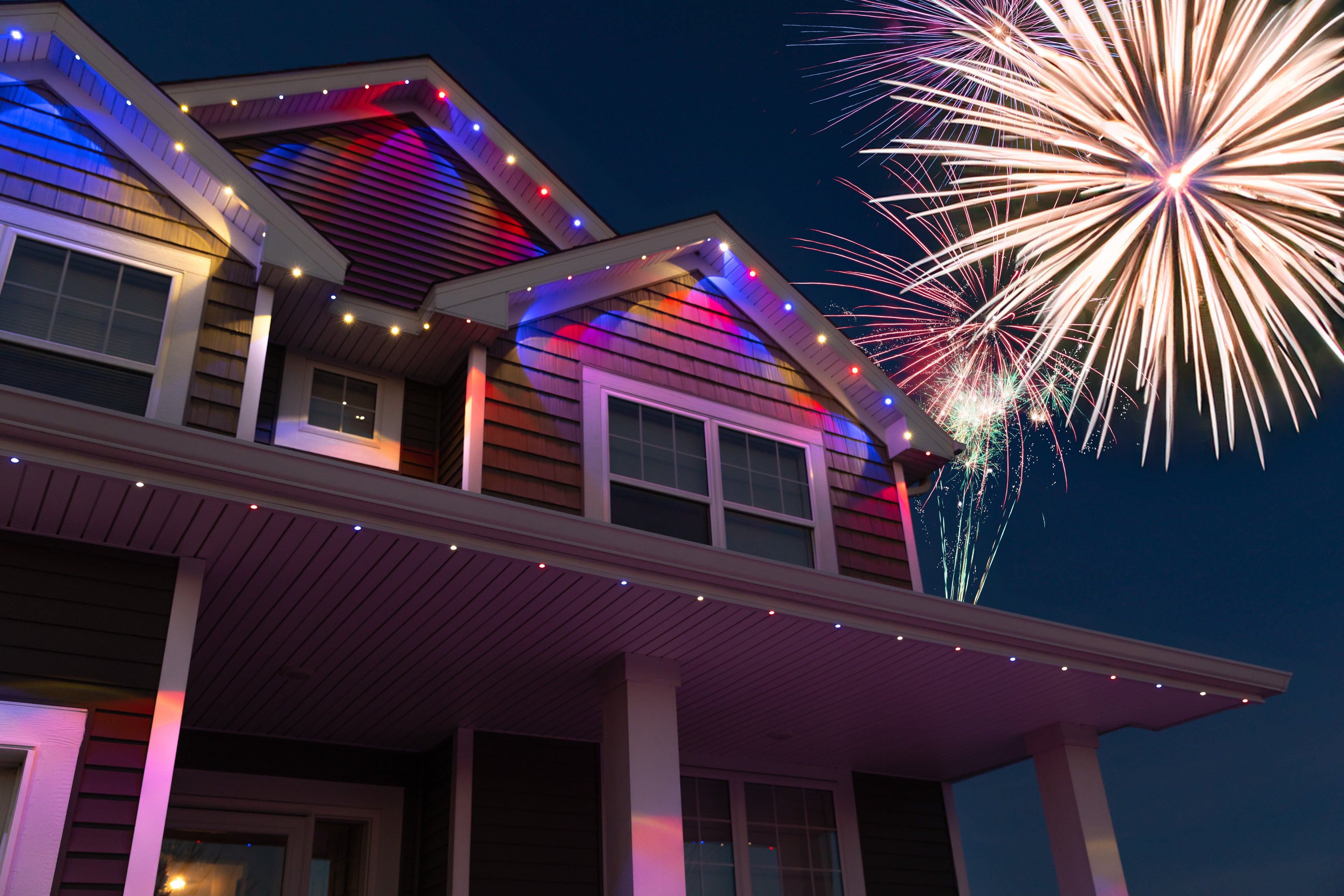 GlowTrax aluminum track installed on roofline with Govee permanent outdoor lights
